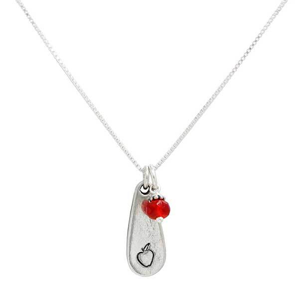 Teacher gift necklace with bright fine pewter teardrop stamped with and apple, and hung with a red stone representing an apple Teacher gift necklace with bright fine pewter teardrop stamped with and apple, and hung with a red stone representing an apple