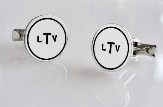 Pair of silver cuff links with the monogram LTV