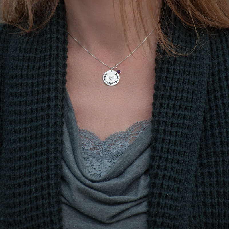 Woman wearing Love for Teacher necklace