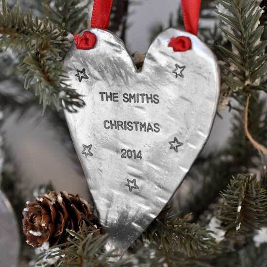 Hand stamped heart christmas ornament with family name 