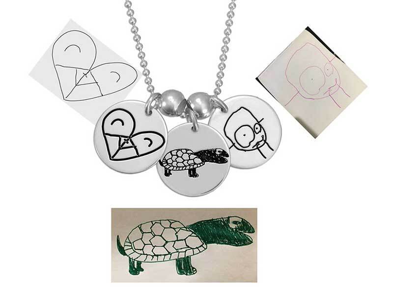 Custom Silver Handwriting Jewelry Charms personalized with child's original artwork, shown with the original artwork used to create it